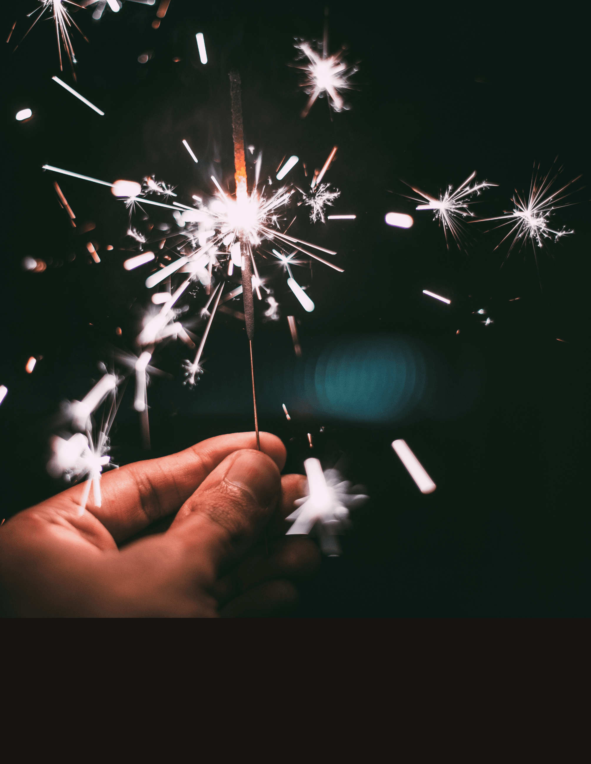 Website Template: Hand holding sparkler 