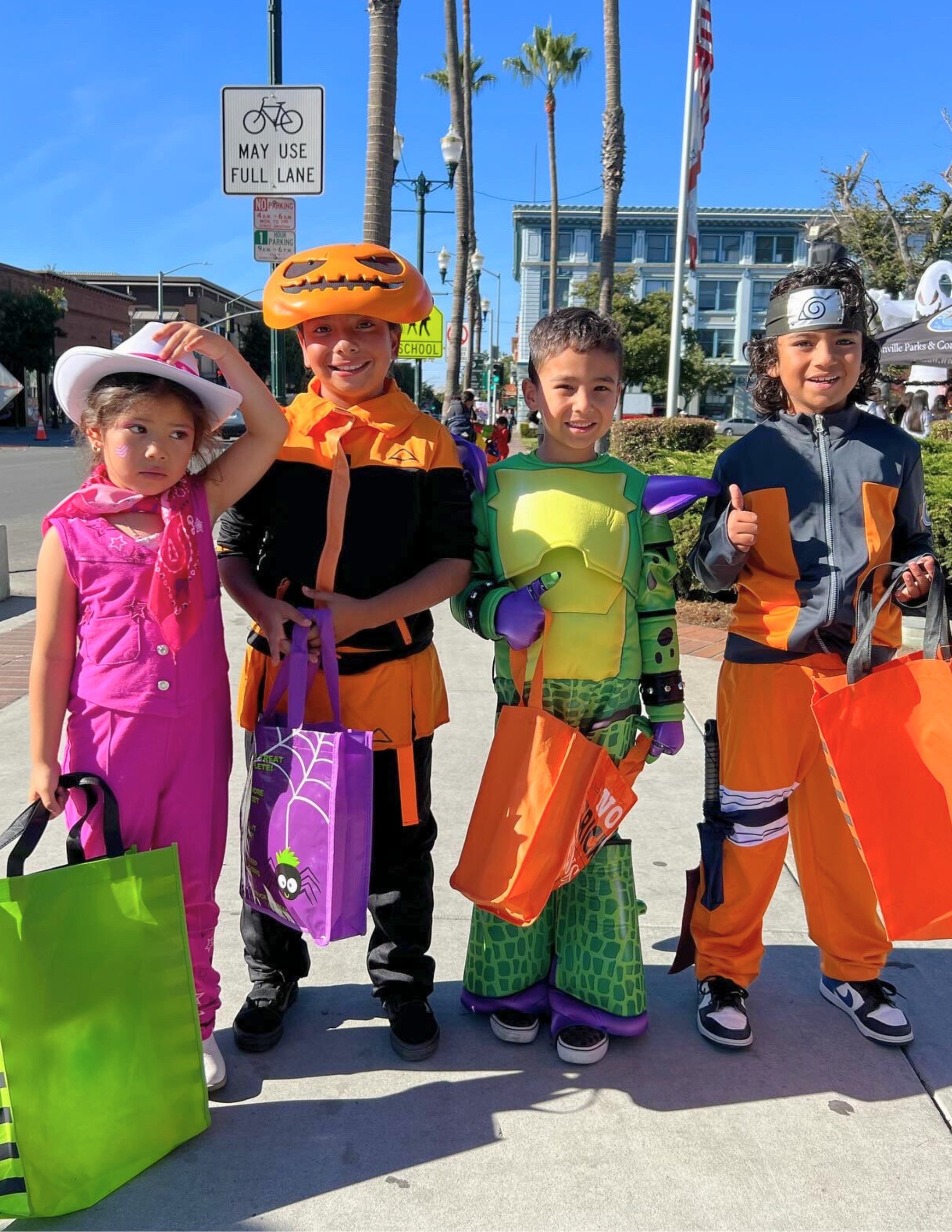Fall Winter Fun Guide Cover of 4 kiddos in their Halloween costume