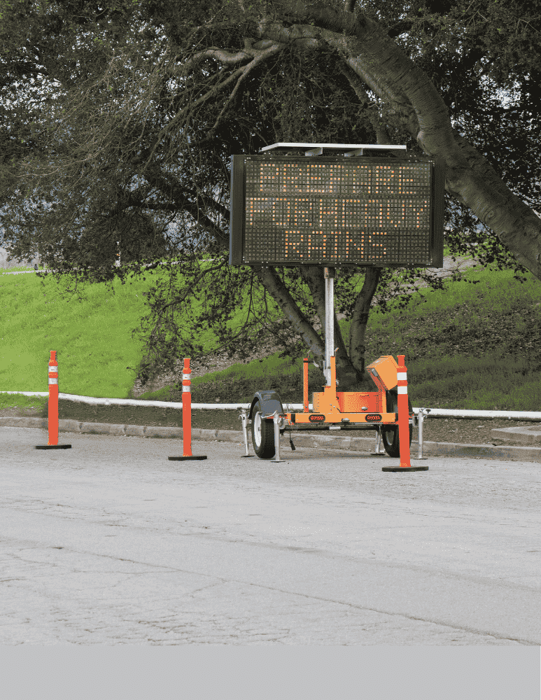 Mobile display board parked in a neighborhood reading 